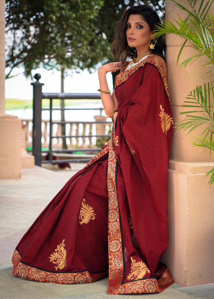 Maroon cotton saree with exclusive embroidered motifs and banarasi border