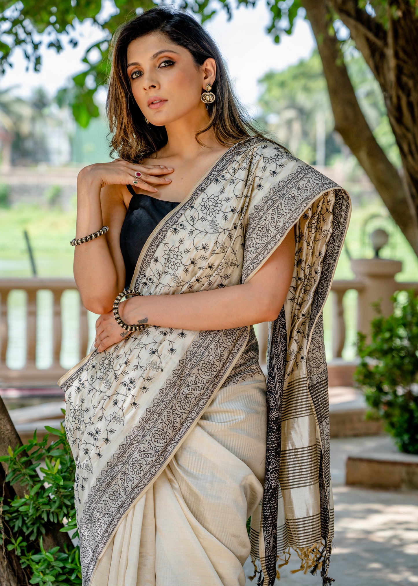 Classic semi sillk heavy embroidered off white saree