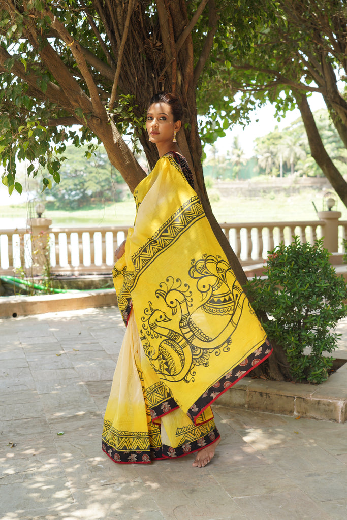 Beautiful handpainted yellow chanderi saree with Ajrakh border