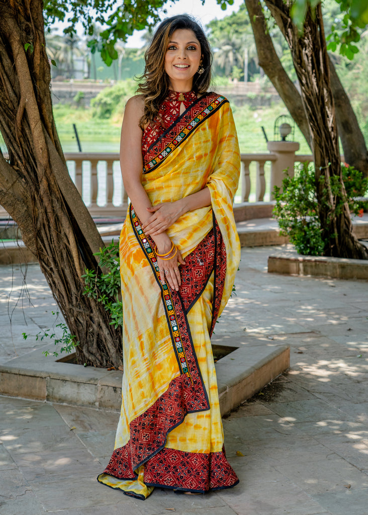 Exclusive Linen shibori saree with Ajrakh & Kutchi Mirror work border