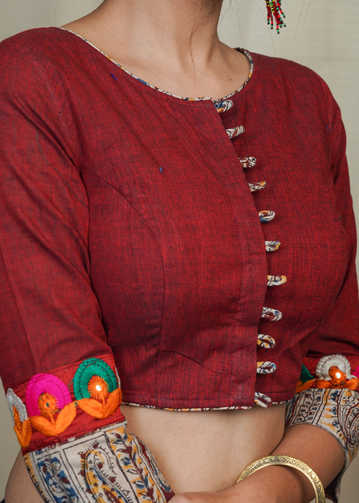 Maroon Cotton Handloom Blouse with Kalamkari and embroidered lace at the sleeves .Lining given