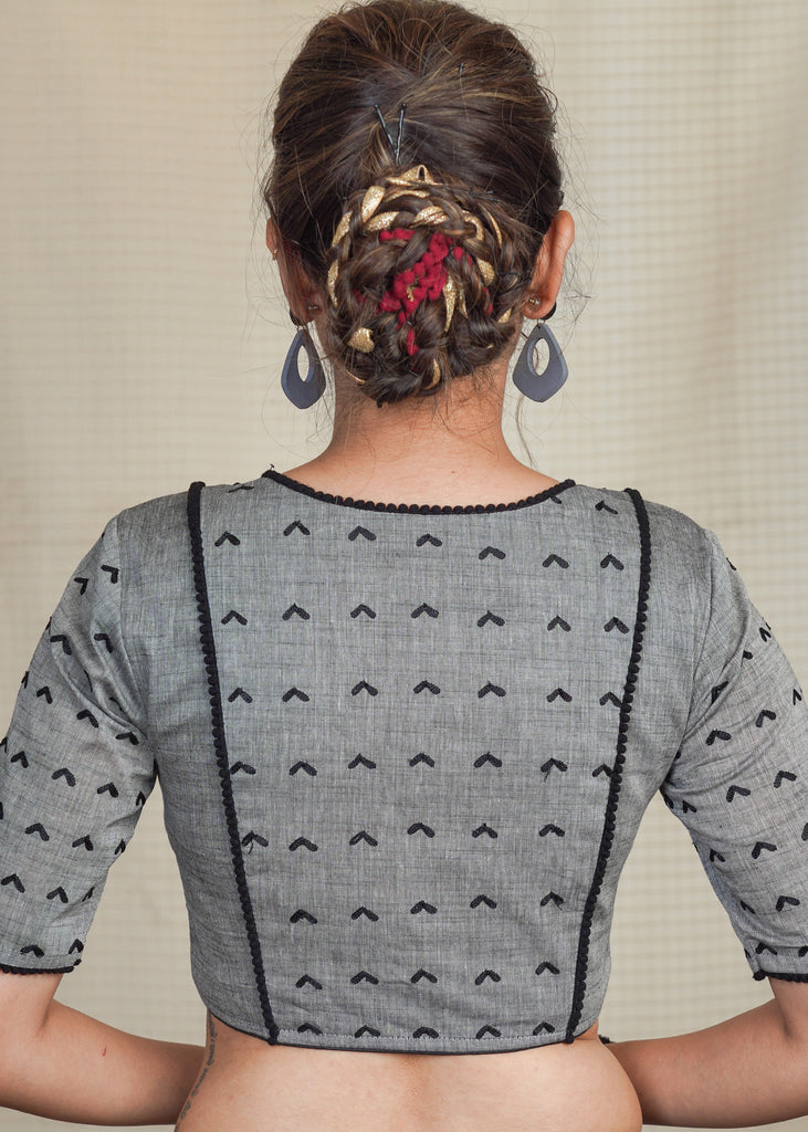 Grey Cotton Handloom Blouse with  Embroidery work all over and pom pom lace . Lining Given