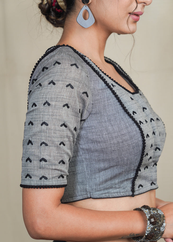 Grey Cotton Handloom Blouse with  Embroidery work all over and pom pom lace . Lining Given