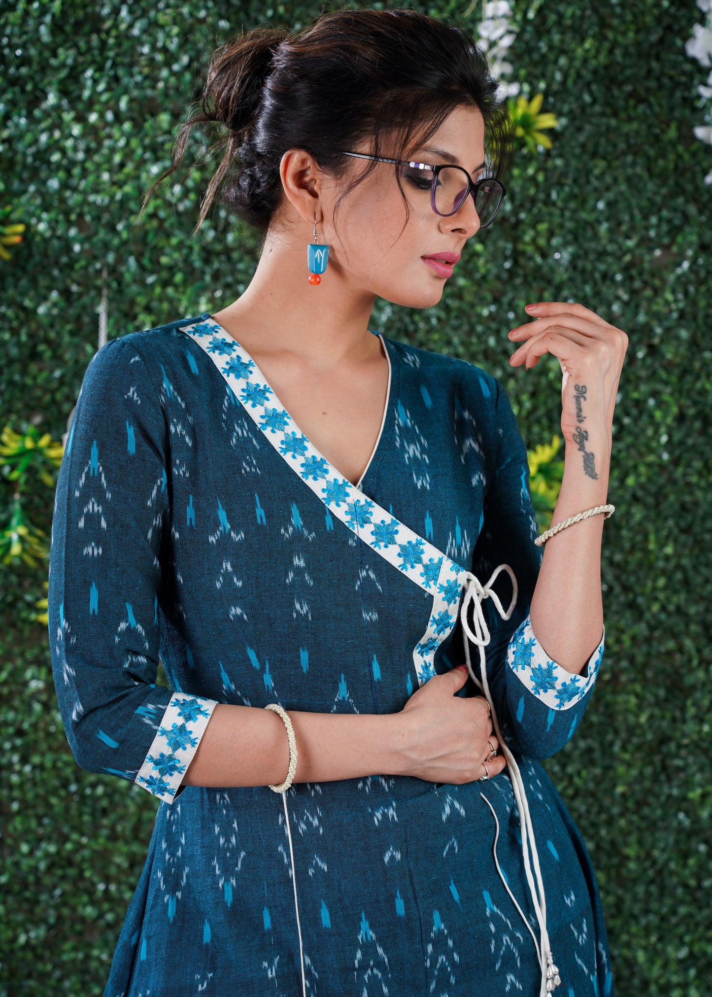 Turquoise Blue cotton  ikat kurta in Angarkha style with embroidery on Neck & Sleeves