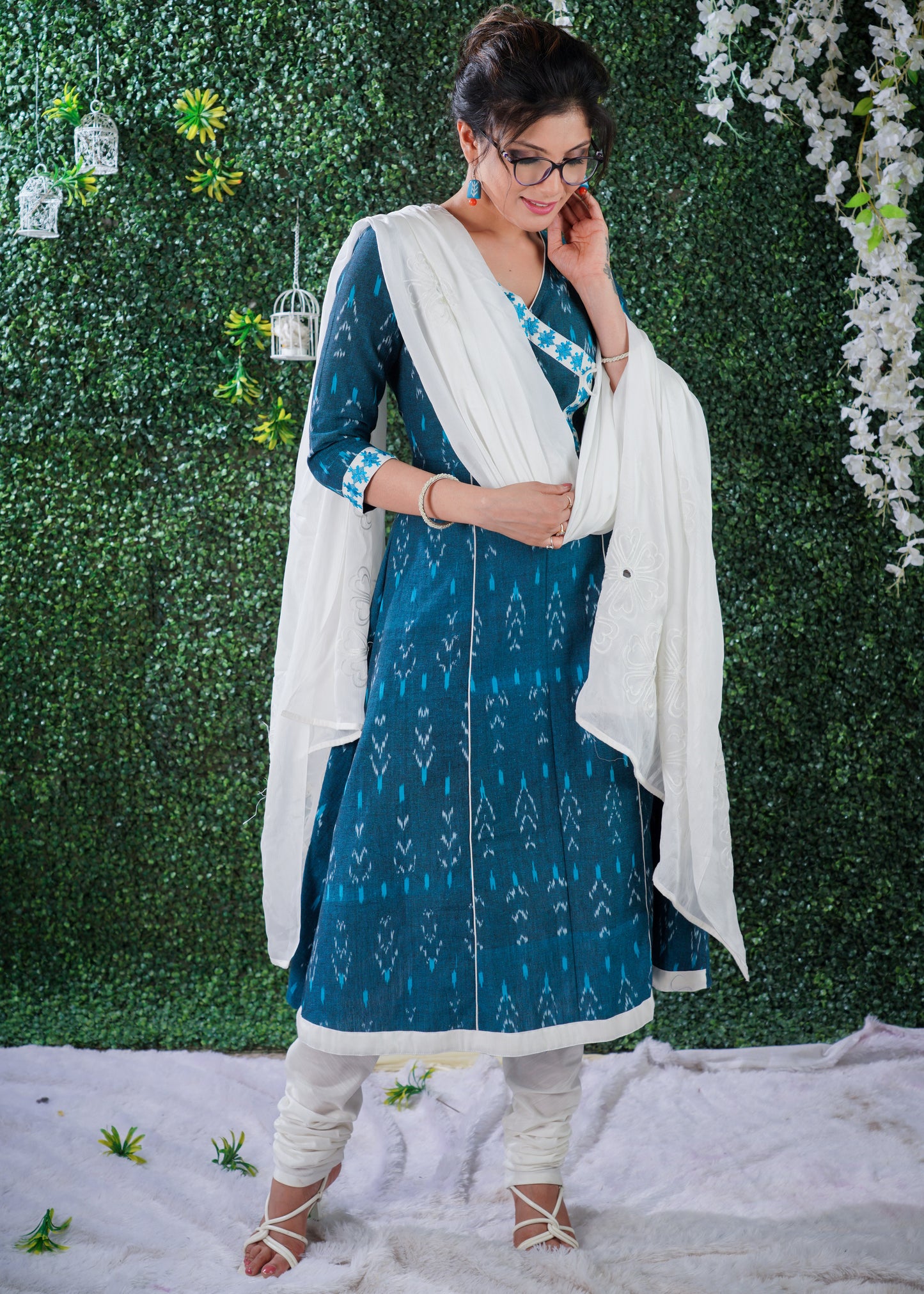 Turquoise Blue cotton  ikat kurta in Angarkha style with embroidery on Neck & Sleeves