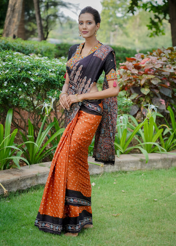 Pure modal silk block printed blue Ajrakh saree with floral motifs