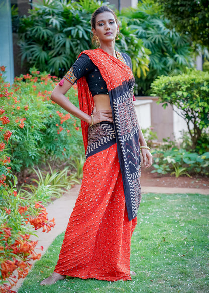 Beautiful orange cotton saree with exclusive Ajrakh & Bandhej combination