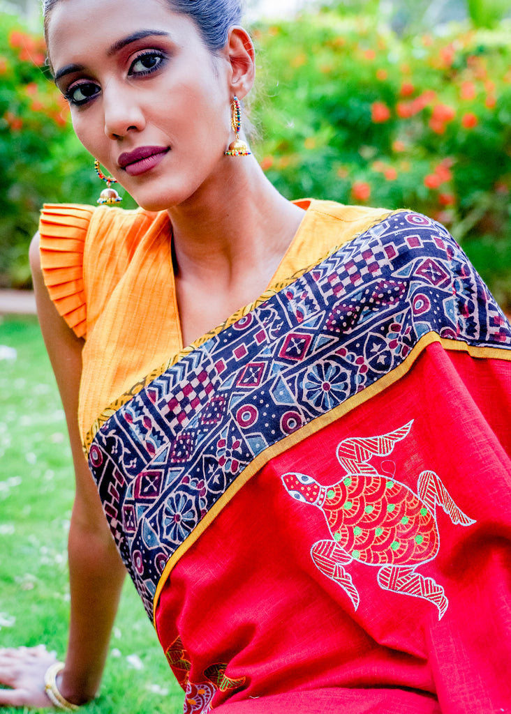 Maroon cotton saree with exclusive Ajrakh combination with Gond painting