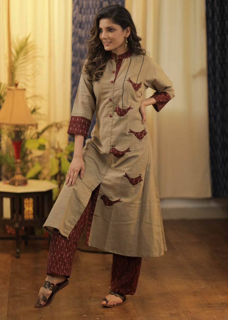 A-line Handloom Cotton kurta with exclusive Hand Cut Ikat Birds and Embroidery.