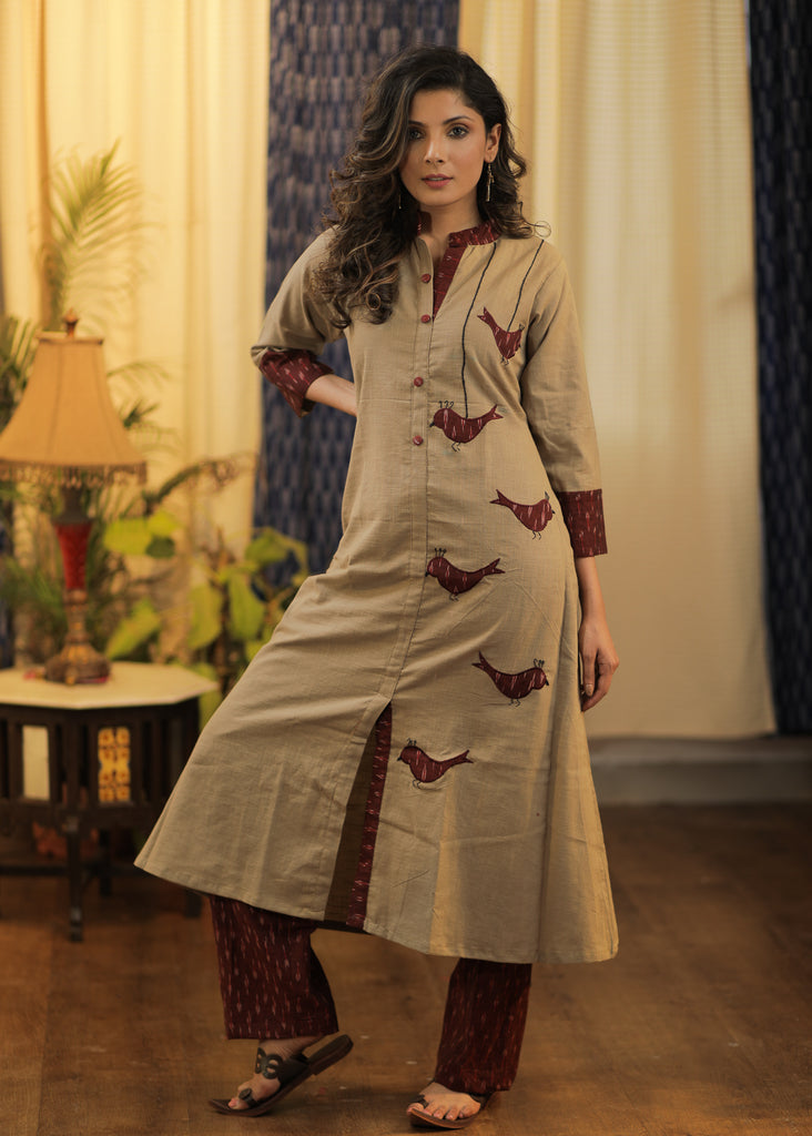 A-line Handloom Cotton kurta with exclusive Hand Cut Ikat Birds and Embroidery.