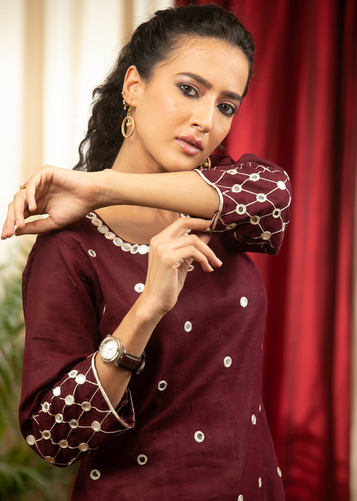 Exclusive brown cotton top with hand embroidered mirror work