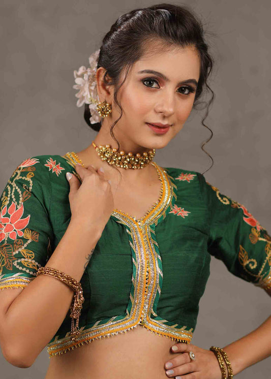Elegant Bottle Green Cotton Silk Blouse with Lotus Embroidery on Back and Sleeves Highlighted with Gota Patti Lace