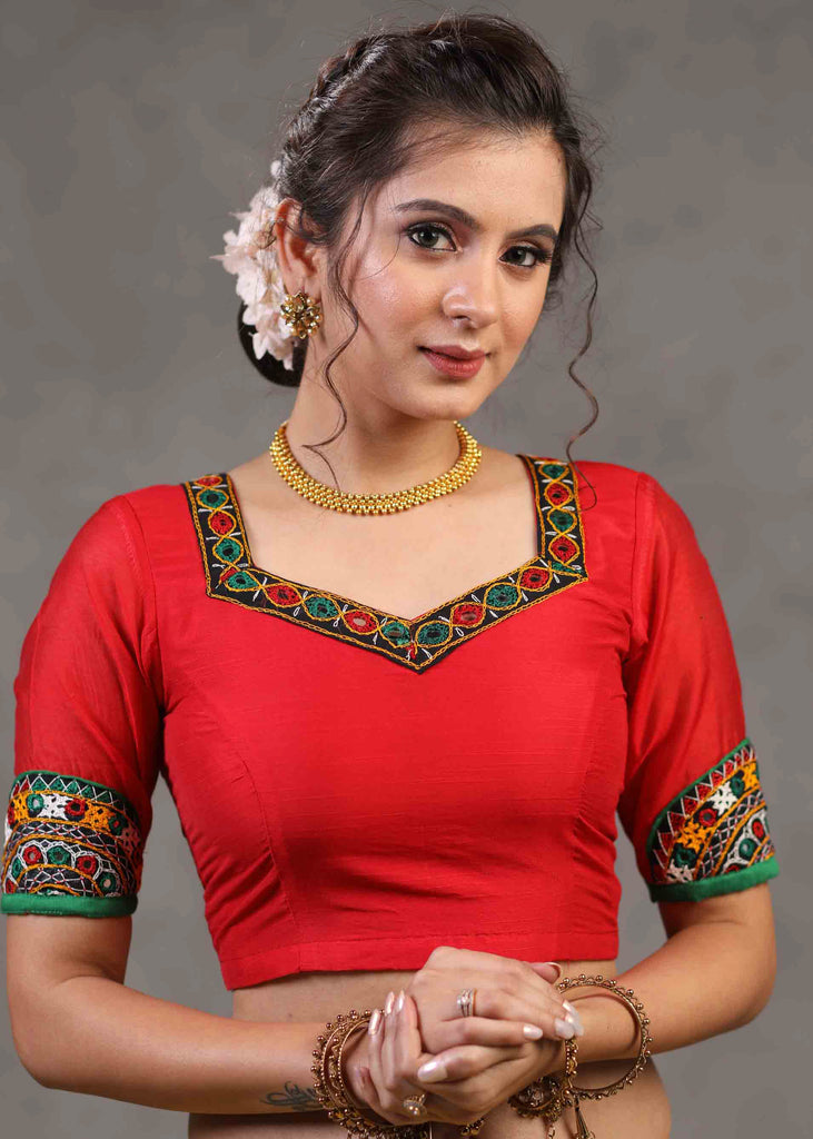 Elegant Red Cotton Silk Blouse Highlighted with Kutch Mirror Work Patch on Sleeves and Neckline