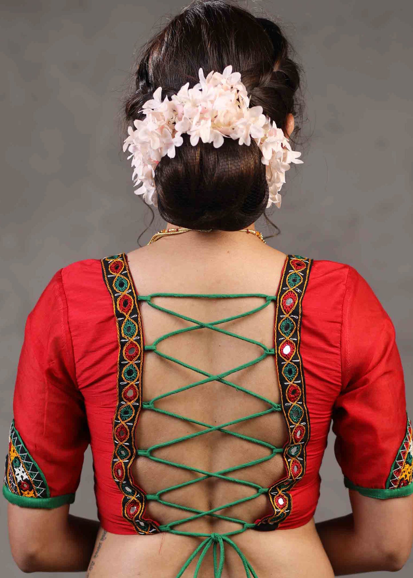 Elegant Red Cotton Silk Blouse Highlighted with Kutch Mirror Work Patch on Sleeves and Neckline
