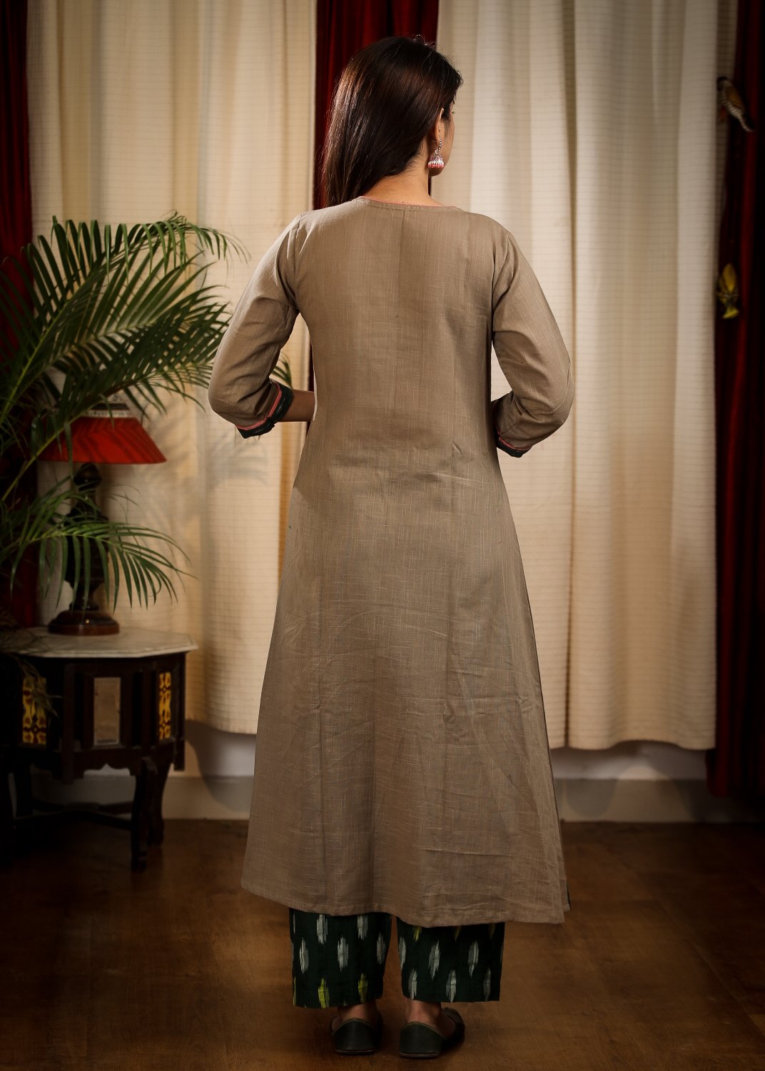 A  - line Cement Color Handloom Cotton  Kurta With Beautiful Peach Embroidery and Ikat Cuffs n Pockets