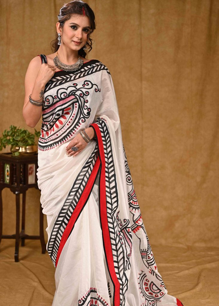 Elegant white Chanderi saree with beautiful painting and mirror work
