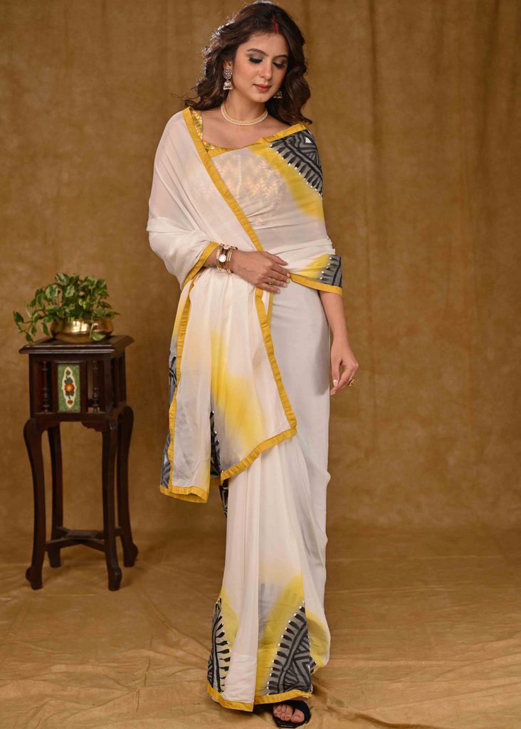 White And Yellow Chiffon Saree with Exclusive Hand painting and Yellow Cotton Silk Border