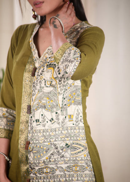A Line Cotton Mehndi Green Kurta With Classy Madhubani print and Zari Border and Wooden Beads.