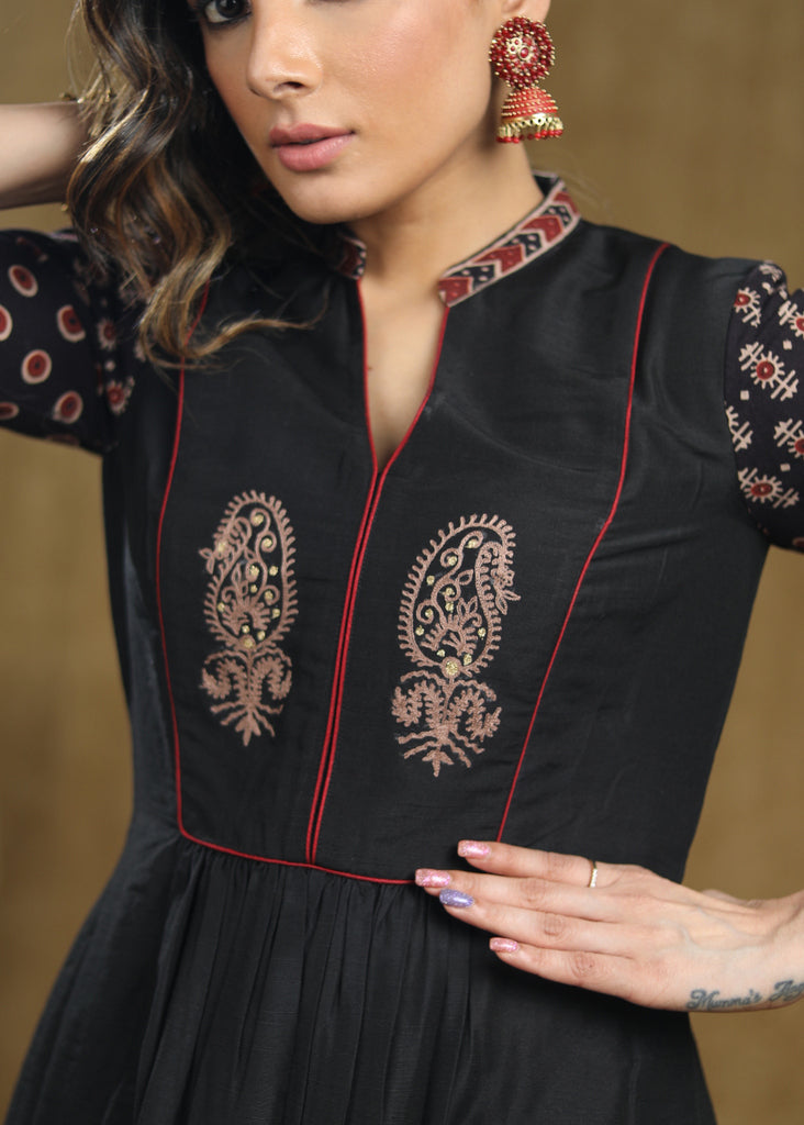 Exclusive Black cotton kurta with Ajrakh sleeves & Ambi embroidery on yoke.
