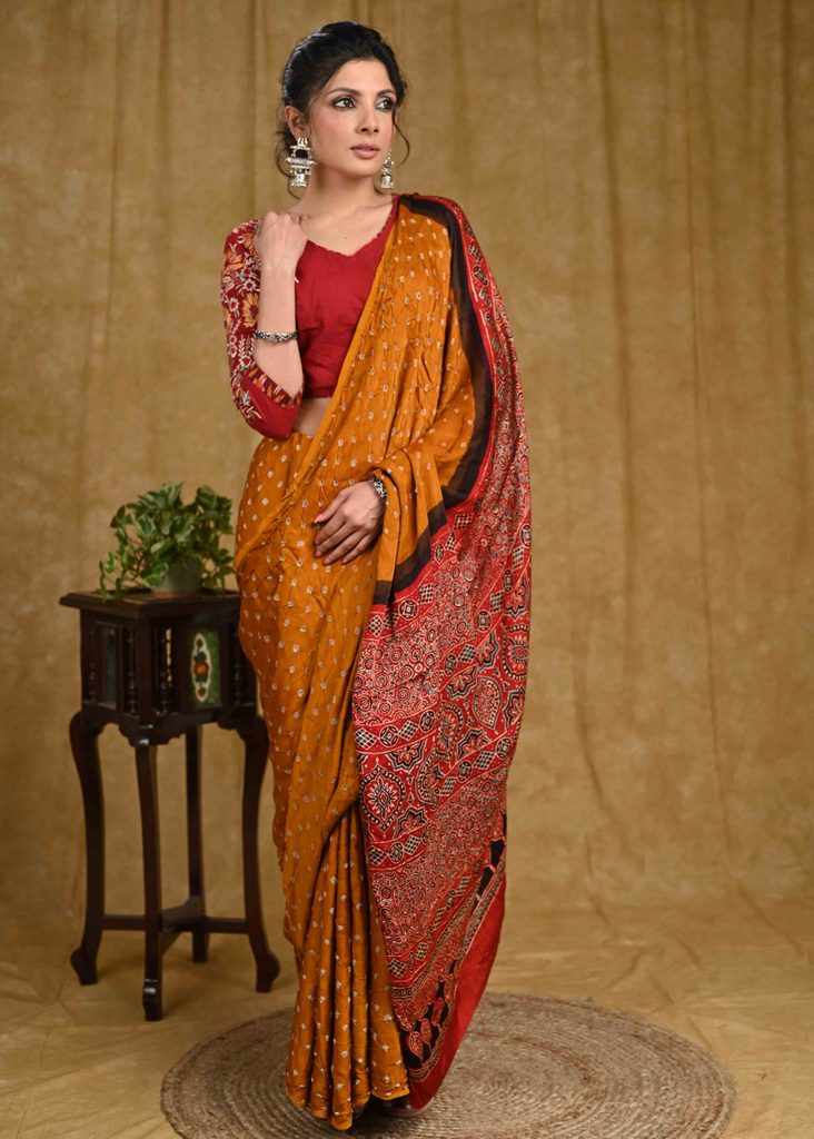 Exclusive modal silk Bandhej saree with Ajrakh block printed border & pallu