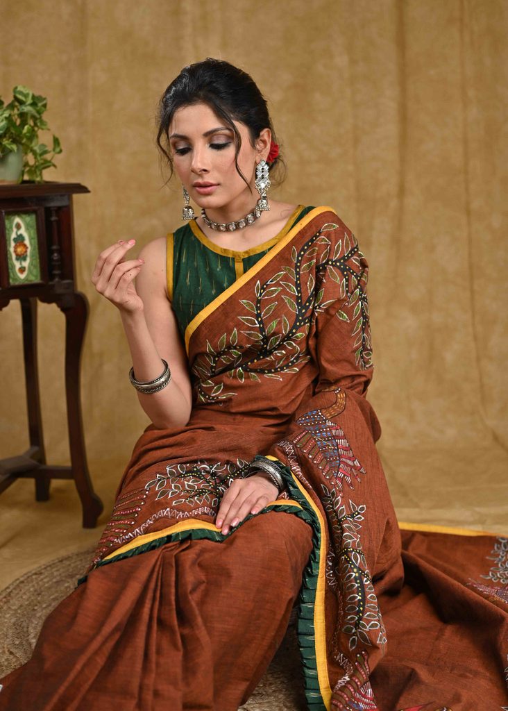Exclusive Brown Gond Painting Cotton Saree with Green Ikaat and Mustard Border