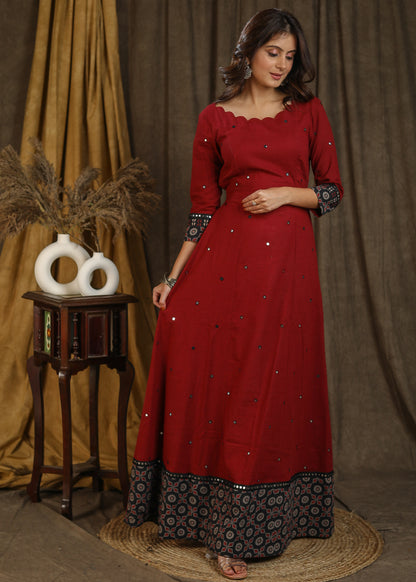Classy maroon ajrakh combination gown with scallops neckline and all over mirror embroidery