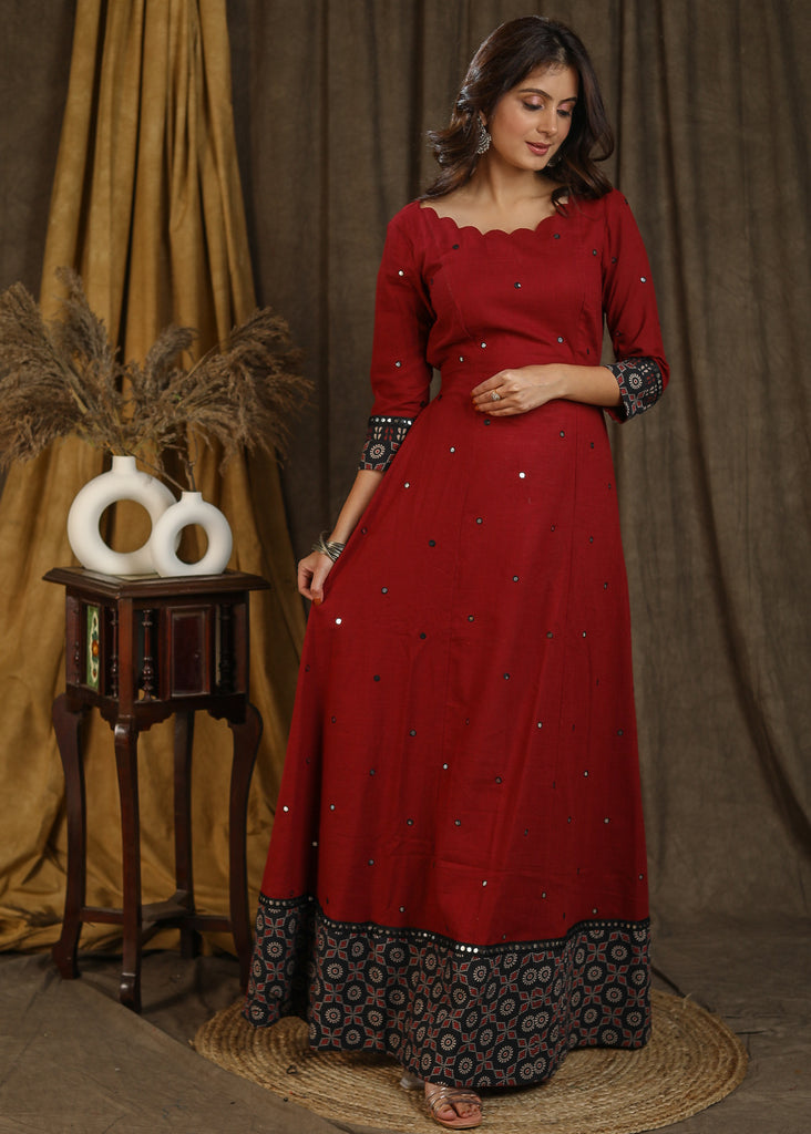 Classy maroon ajrakh combination gown with scallops neckline and all over mirror embroidery
