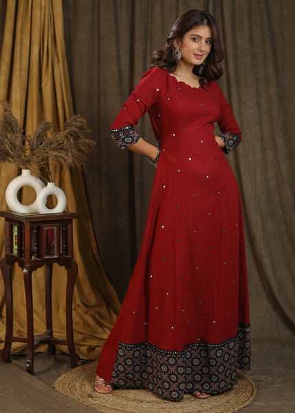 Classy maroon ajrakh combination gown with scallops neckline and all over mirror embroidery