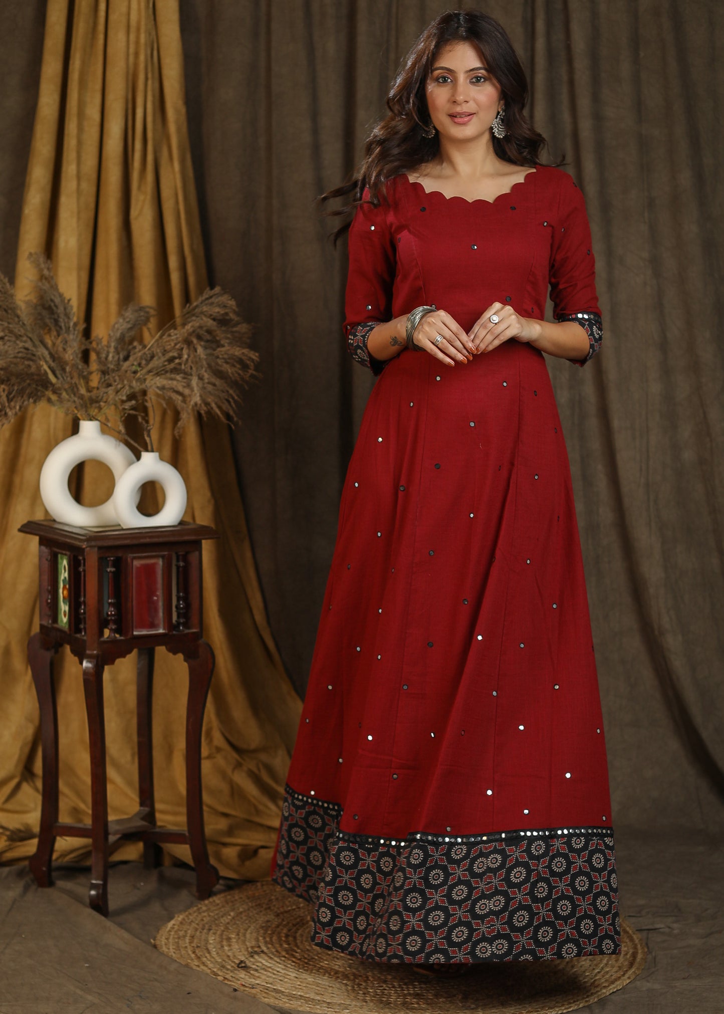 Classy maroon ajrakh combination gown with scallops neckline and all over mirror embroidery