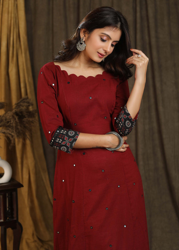 Classy maroon ajrakh combination gown with scallops neckline and all over mirror embroidery