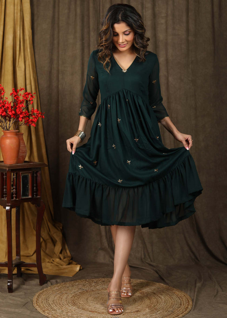 Beautiful bottle green gathered dress with minimal hand embroidery and georgette hemline