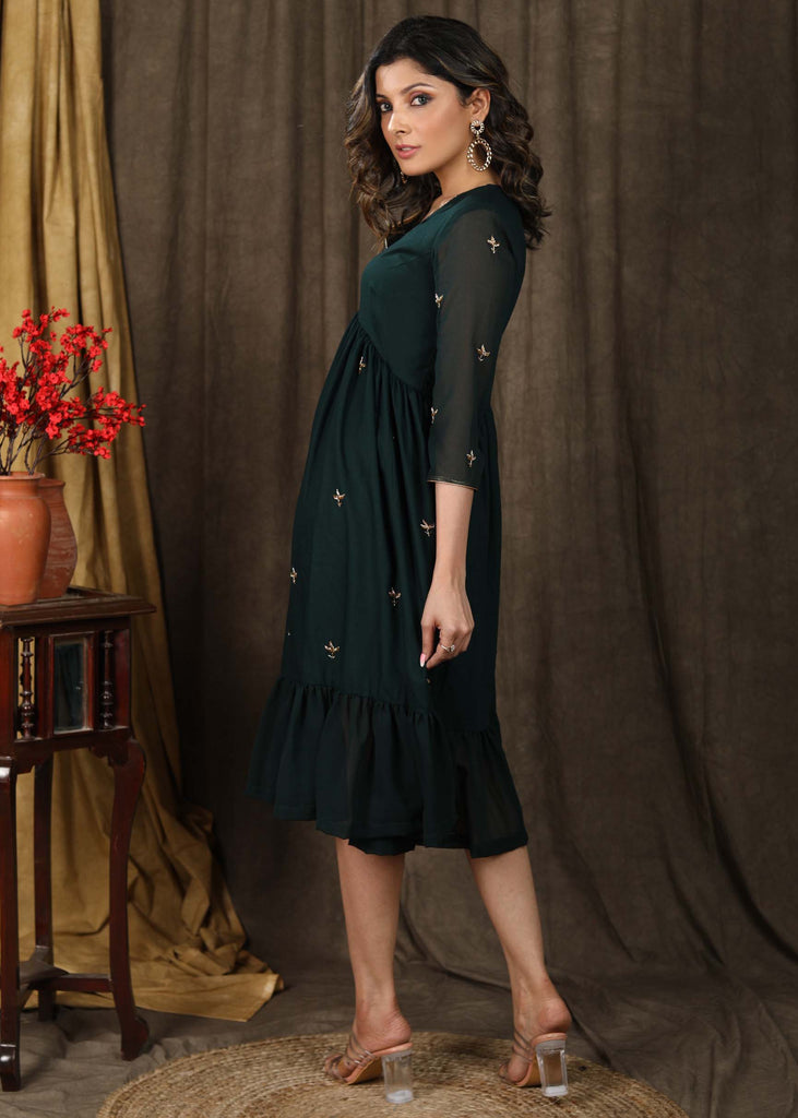 Beautiful bottle green gathered dress with minimal hand embroidery and georgette hemline