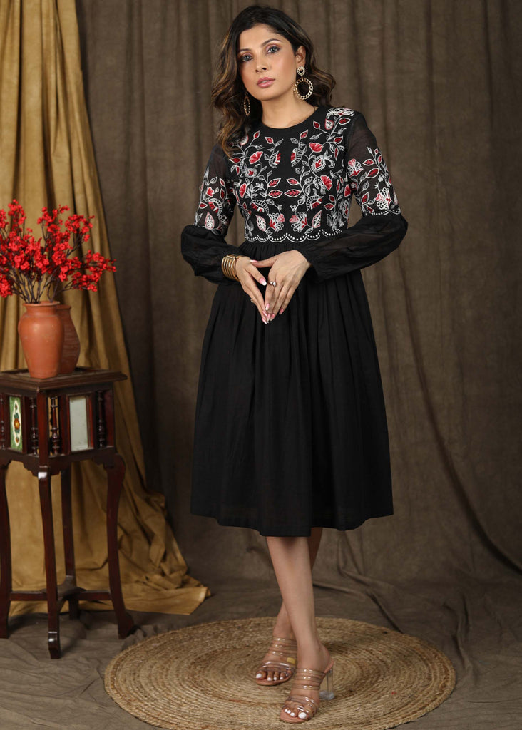 Trendy black cotton gathered dress with beautiful zari embroidery combined with chanderi sleeves