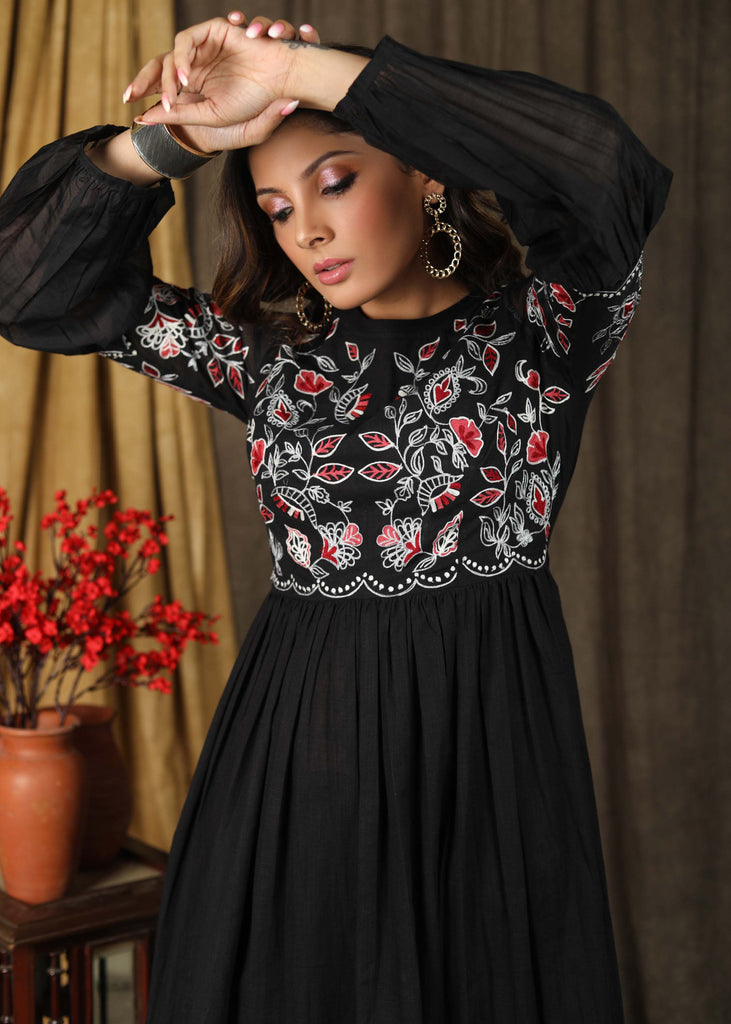 Trendy black cotton gathered dress with beautiful zari embroidery combined with chanderi sleeves