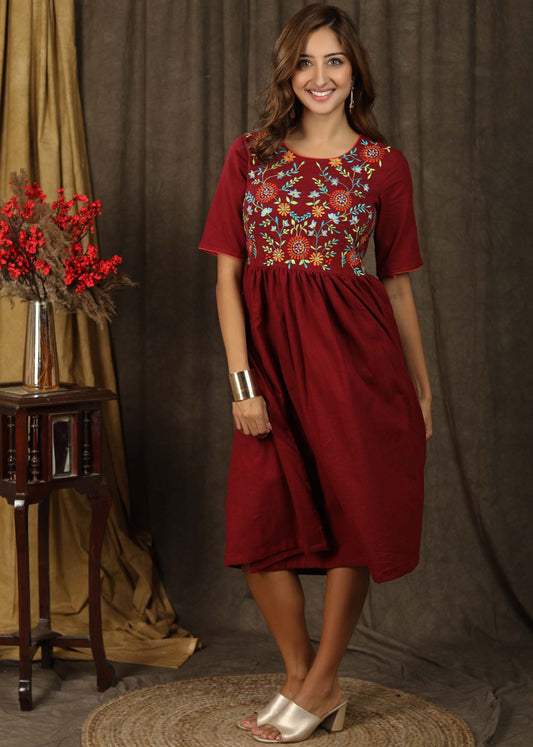 Classic maroon gathered dress with minimal floral embroidery and elbow sleeves
