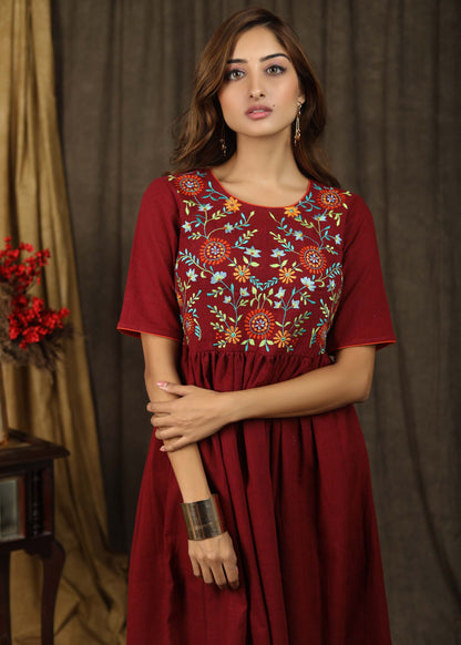 Classic maroon gathered dress with minimal floral embroidery and elbow sleeves