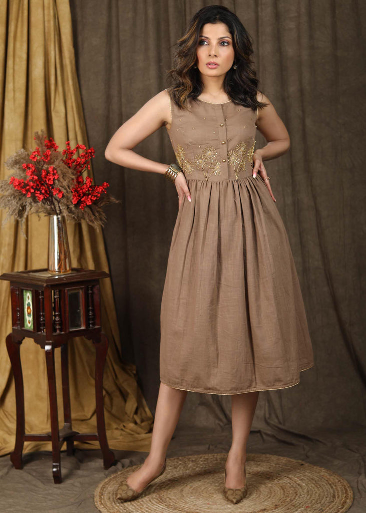Subtle beige sleeveless gathered dress with beautiful hand embroidery