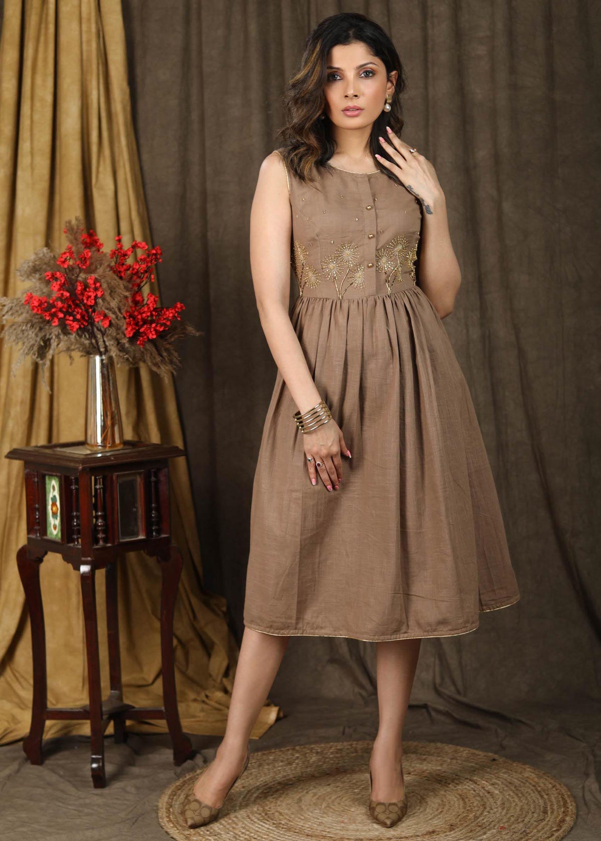 Dussehra Sale — Subtle beige sleeveless gathered dress with beautiful hand embroidery