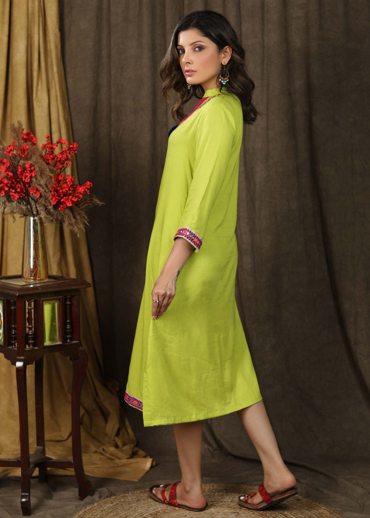 Stylish parrot green tunic dress with sparrow embroidery on yoke highlighted with elegant multicolor lace