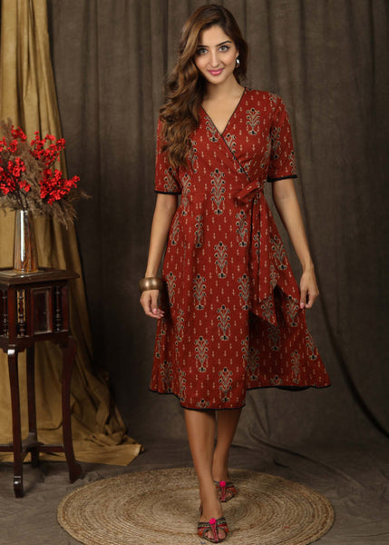 Trendy brick brown aztec print overlap dress highlighted with subtle pompom lace