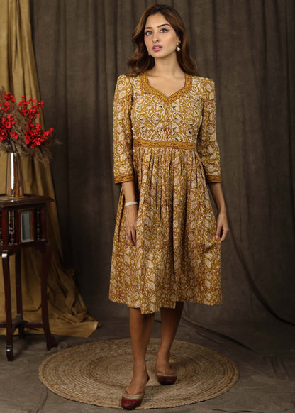 Casual mustard floral printed gathered dress with highlighted with beautiful pearl hand embroidery