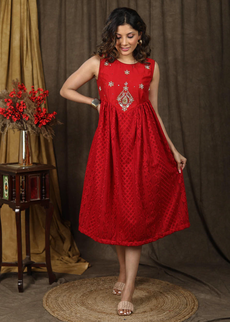 Classy maroon chikankari dress with beautiful hand embroidered yoke.