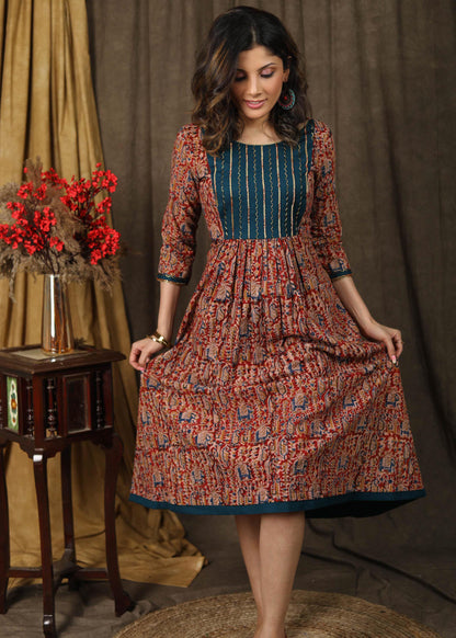 Elegant kalamkari dress with beautiful teal embroidered yoke