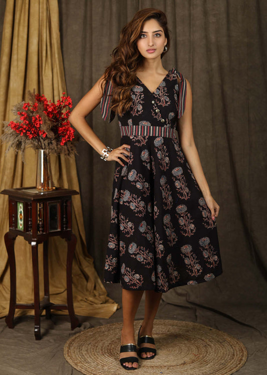 Subtle hand block Ajrakh and kantha combination A-line dress highlighted with classy buttons