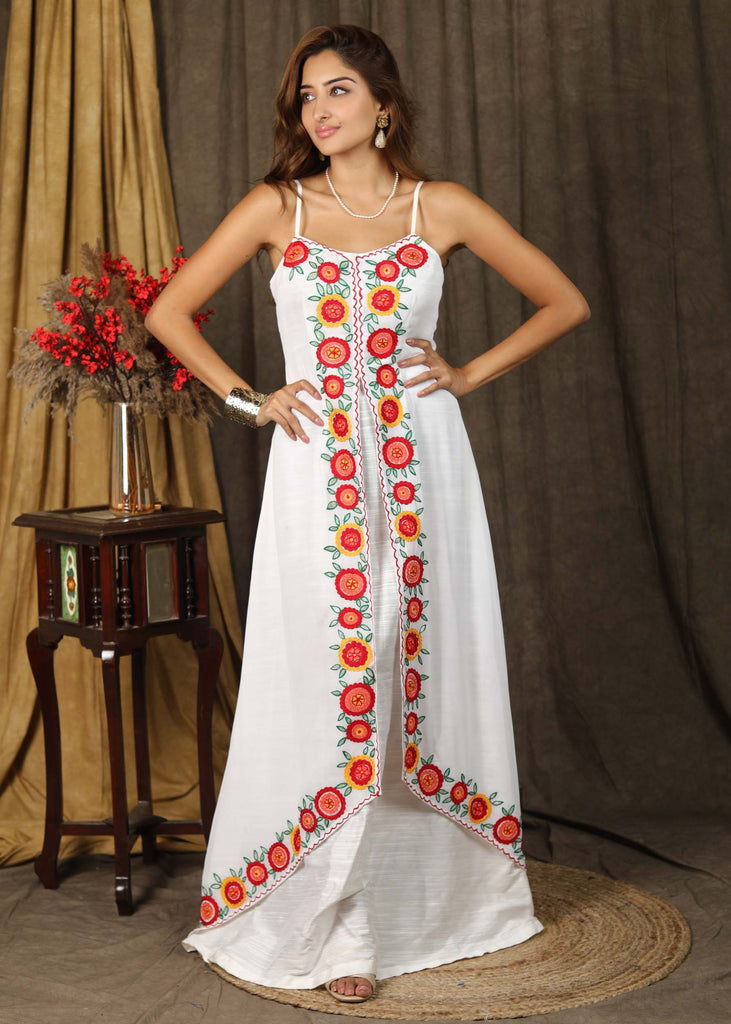 Classy white boho inspired strappy maxi dress with floral embroidery on front layer with optional georgette shrug
