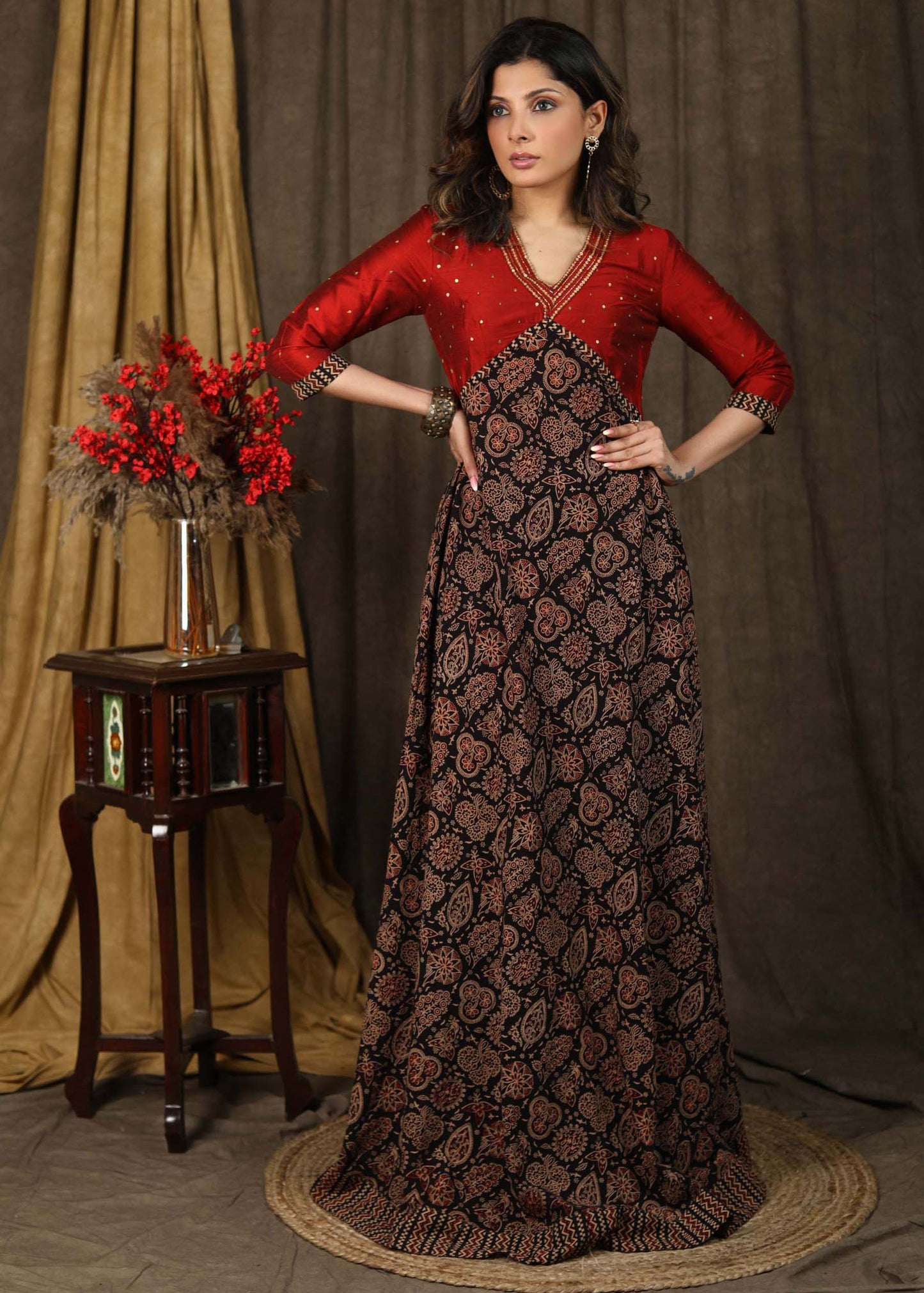 Classy ajrakh combination Kalidaar gown highlighted with hand embroidery on neck and sleeves