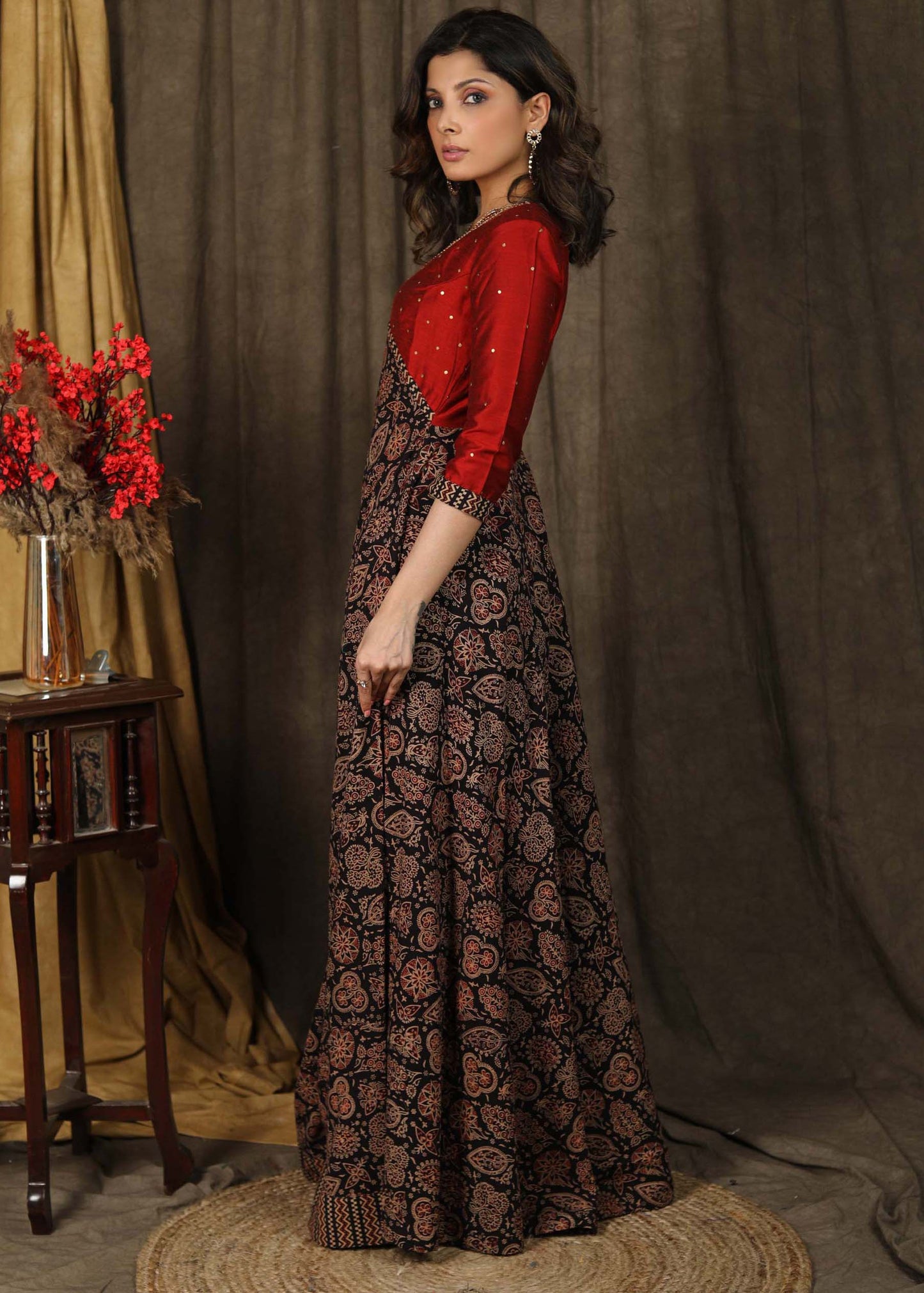 Classy ajrakh combination Kalidaar gown highlighted with hand embroidery on neck and sleeves