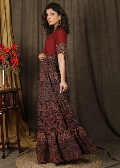 Elegant Ajrakh combination Kalidaar Gown with elbow sleeves highlighted with coin embellishments