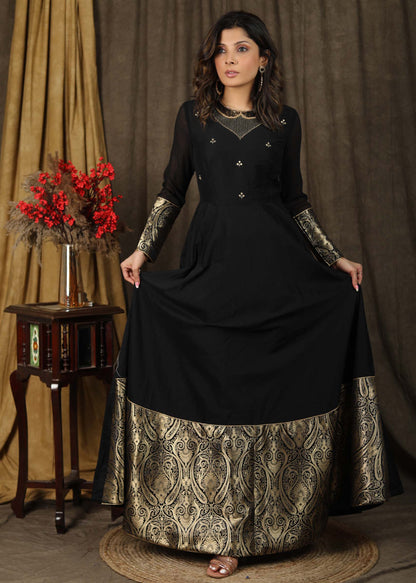 Elegant Black hand embroidered Kalidaar gown highlighted with banarasi border on hemline and sleeves