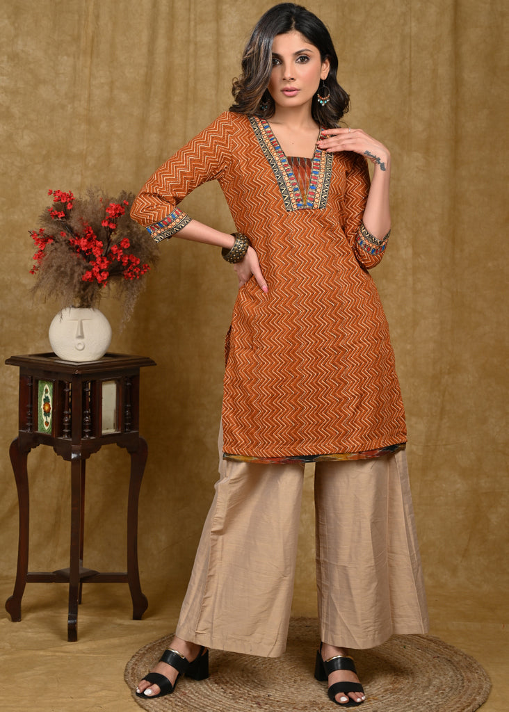 Exclusive Cotton Ajrakh Printed Tunic with madhubani Handpainted Lace on Sleeves and Neckline